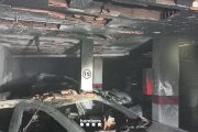 Estat en que ha quedat el pàrquing afectat per un incendi.
