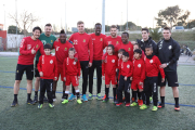 Els futbolistes del primer equip apadrinen els 40 equips grana