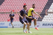 Ferran Giner, a la dreta de la imatge, acompanyat de Valentín durant un entrenament.