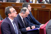 Josep Rull, Jordi Turull i Jordi Sànchez, durant la primera jornada del judici de l'1-O el 12 de febrer del 2019