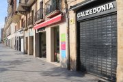 Les botigues de la Rambla Nova tancades.