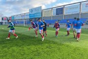 Els futbolistes del Nàstic exercitant-se abans de començar el duel a Palamós.