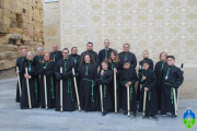 Grup de membres de la Germandat durant el viacrucis del 2019.