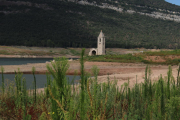 El campanar i l'església