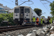 Tren que ha descarrilado cerca de la estación de Sitges.