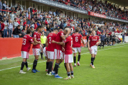 Jugadors del Nàstic celebrant un gol.