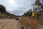 Encreuament del camí de la Selva amb la riera de l'Abeurada.