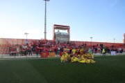 Els jugadors del Nàstic amb l'afició desplaçada.