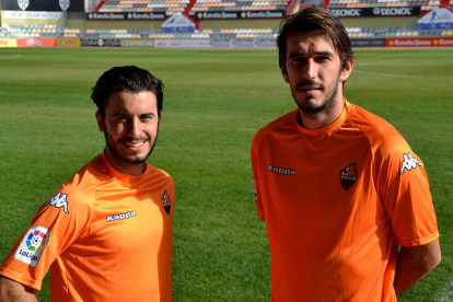 Raphael Guzzo i Dejan Lekic, amb la samarreta taronja.