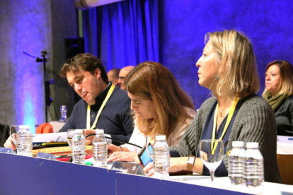 El coordinador organitzatiu del PDeCAT, David Bonvehí; la coordinadora general, Marta Pascal; i la presidenta en funcions del partit, Neus Munté, durant el Consell Nacional de la formació a l'edifici AXA de Barcelona.