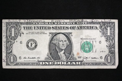 Imatge del bitllet d'un dòlar amb el missatge.