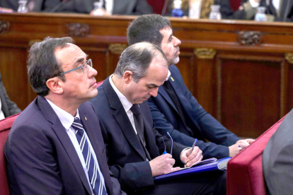 Josep Rull, Jordi Turull y Jordi Sànchez, durante la primera jornada del juicio del 1-O el 12 de febrero del 2019