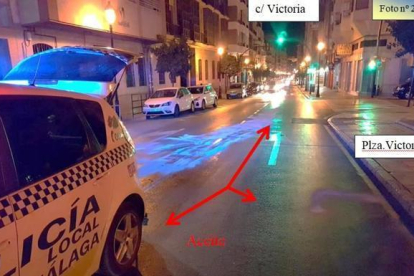 Imatge de la policia local de Màlaga on s'assenyala la presència d'oli a la calçada.