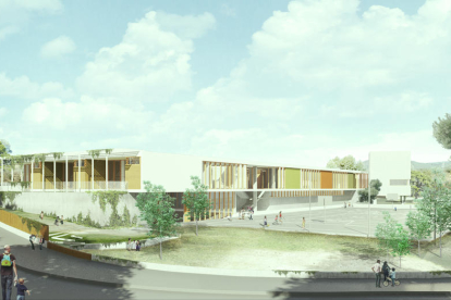 Panorámica de la fachada de la nueva escuela. Al fondo y a la derecha, el edificio independiente de la Biblioteca.