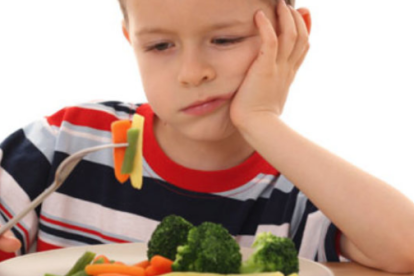 Imagen de un niño a la hora de comer.
