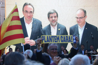 Los candidatos de JxCat Josep Rull, Jordi Sànchez y Jordi Turull, en videoconferencia desde la prisión de Soto del Real.