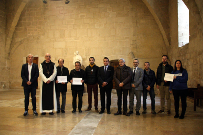 Acte de lliurament dels diners recollits al monestir de Poblet en benefici dels afectats pels aiguats del 22 d'octubre a la Conca.