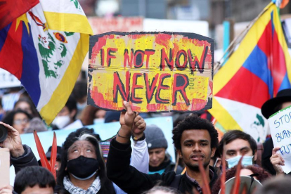 Imatge d'una manifestació d'activitses a Glasgow, durant la COP26