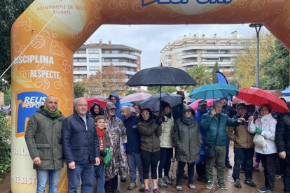 La caminata es va veure afectada per la pluja.