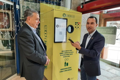 Daniel Rubio, regidor de Medi Ambient, i Carles Prats, regidor d'Empresa i Treball, en la presentació.