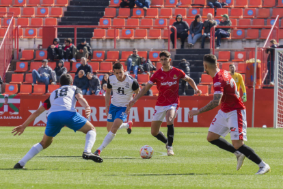 Marc Montalvo y Marc Fernández durante el partido contra el Eldense en el Nou Estadi Costa Daurada.