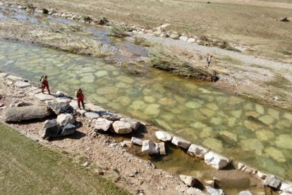 Els equips de rescat reinicien la recerca dels quatre desapareguts en les riuades