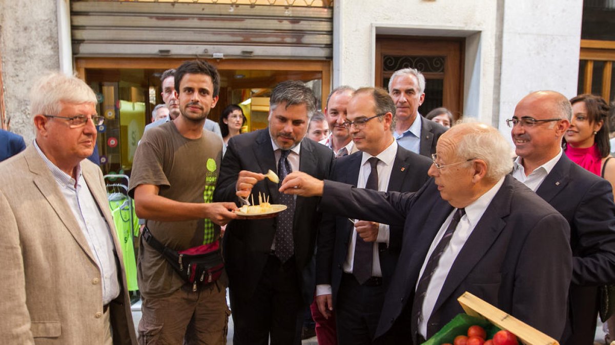 Jordi Turull y Albert Batet, ayer tarde durante la visita del recinto ferial.