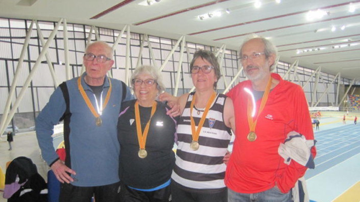 Carme Fuster, Cristina Gallardo, Josep Martí i Eduard Bes, amb les seves medalles d'or.