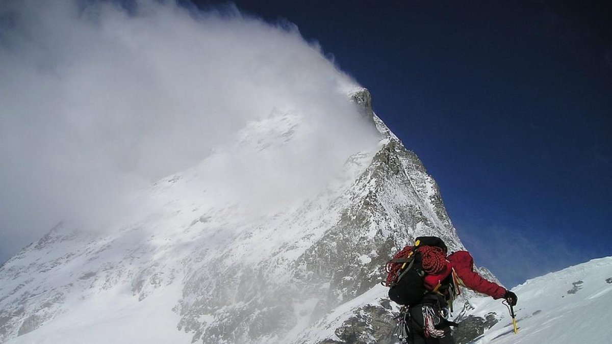 Un alpinista als Alps.