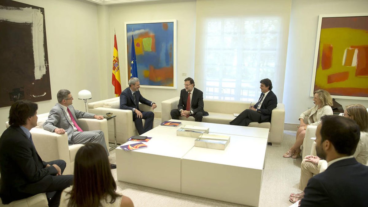 Imagen de archivo del encuentro de Rajoy con SCC el año 2014.