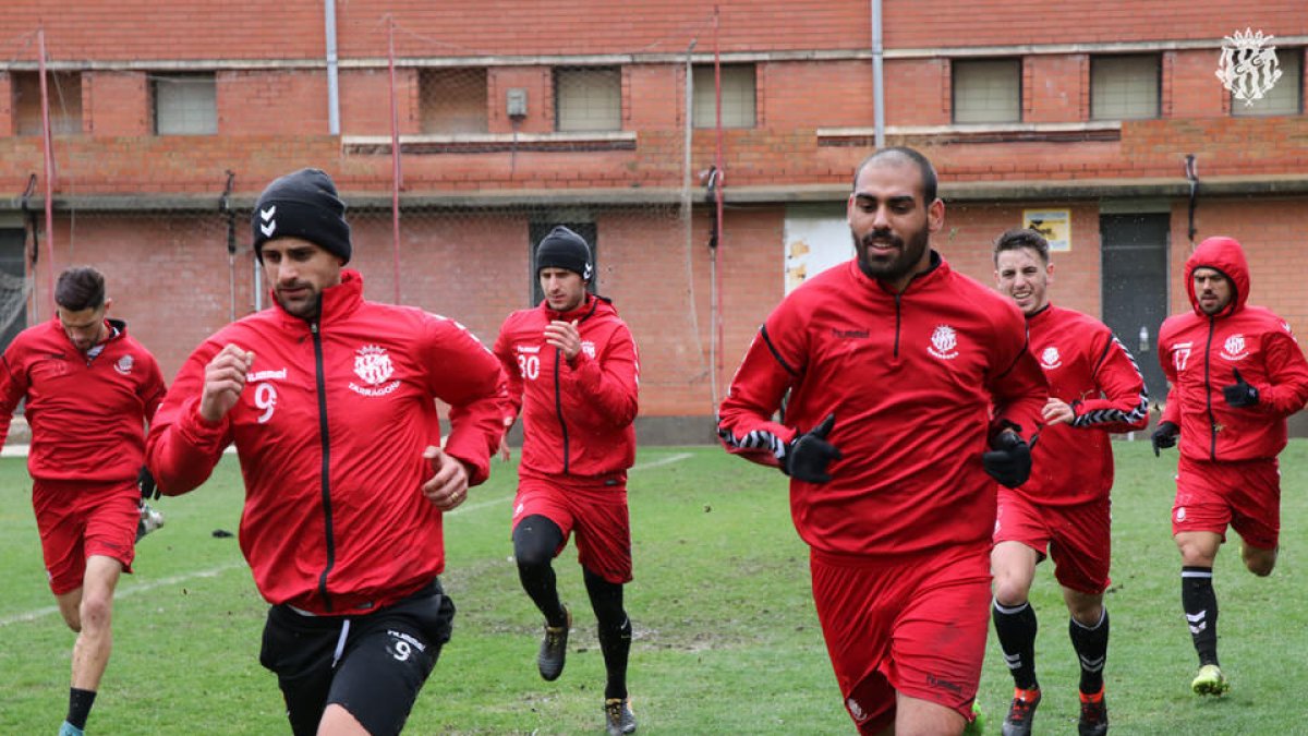 A l'esquerra de la imatge, Javi Márquez i, a la dreta, Fali, durant un entrenament del Nàstic a les instal·lacions del Nou Estadi.