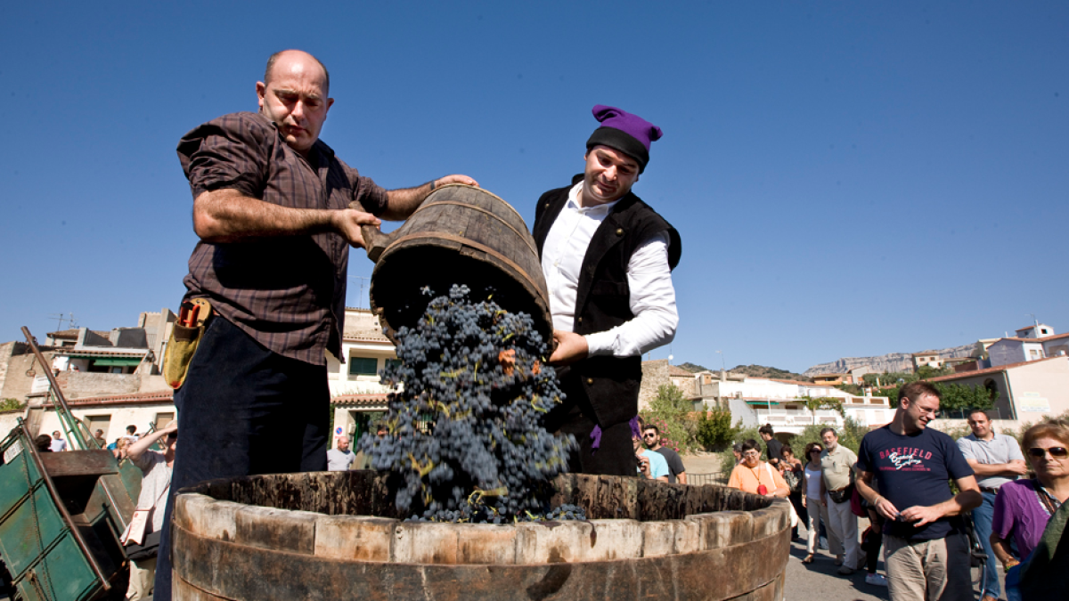 Imagen de la preparación de la Piada, el tradicional pisotón de la uva.