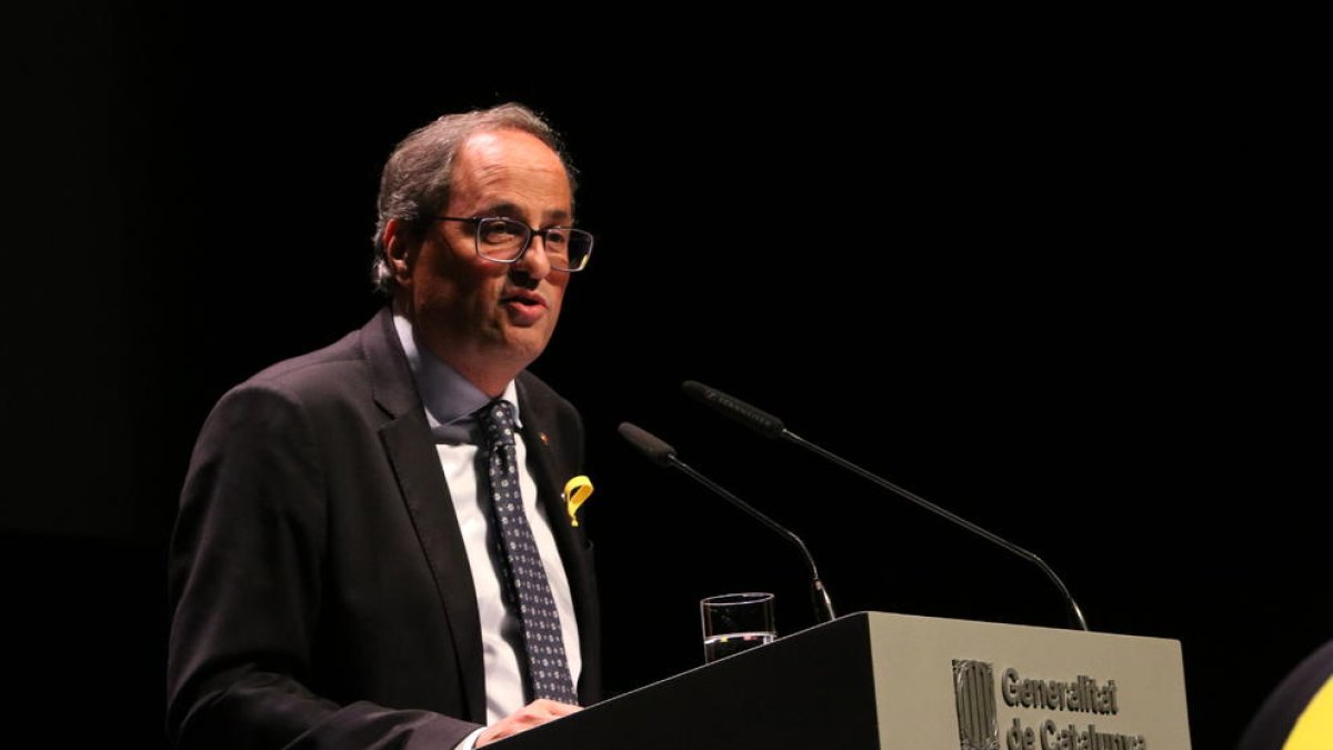 El presidente de la Generalitat, Quim Torra, durante la conferencia 'El nostre moment', en el TNC.