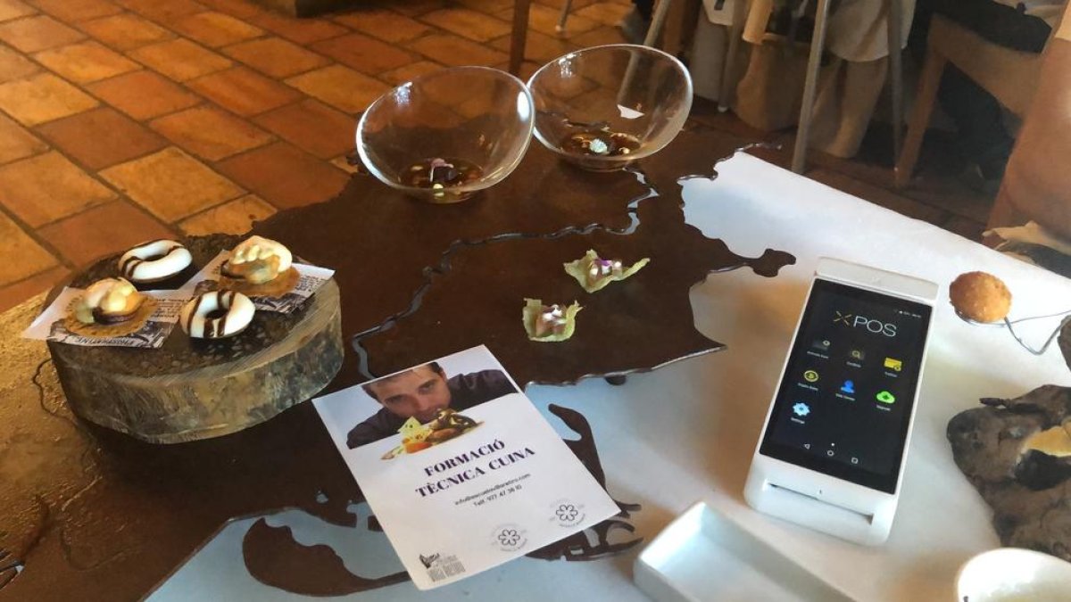 El restaurant disposa d'un terminal de pagament que accepta criptomoneda.