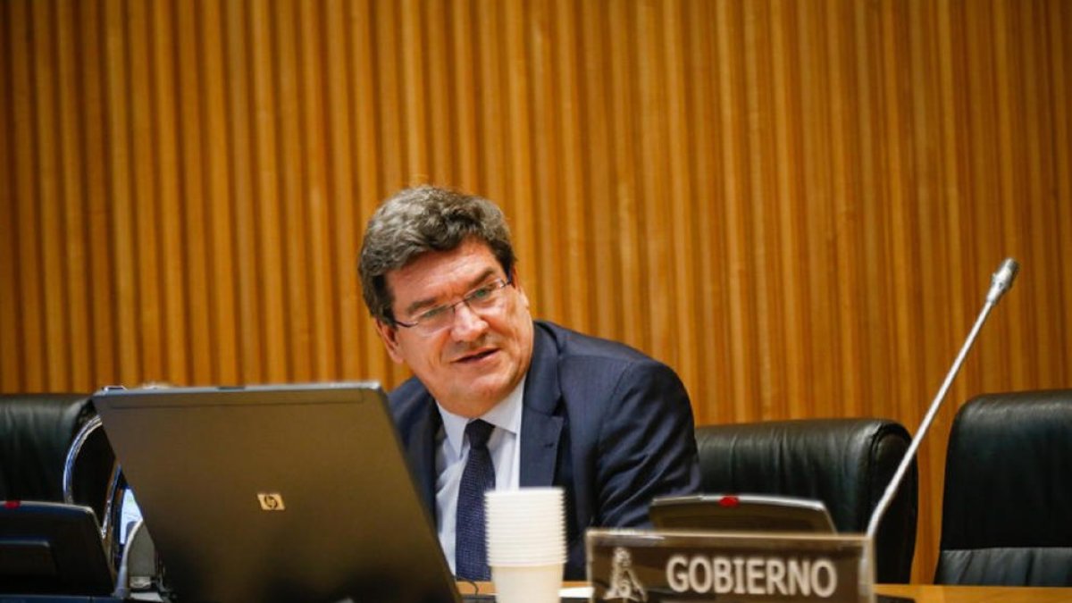 El ministro de Inclusión, Seguridad Social y Migraciones, José Luis Escrivá, durante la comparecencia a la comisión de Trabajo del Congreso.