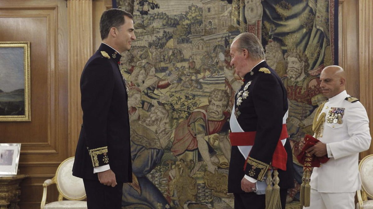 El rey Felipe VI y el rey emérito en una imagen de archivo