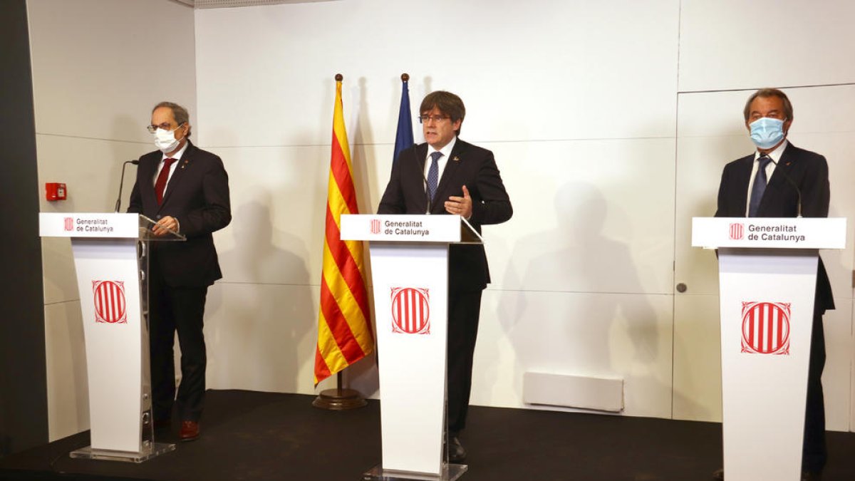 Els expresidents de la Generalitat, Artur Mas, Carles Puigdemont i Quim Torra, en una roda de premsa a Perpinyà