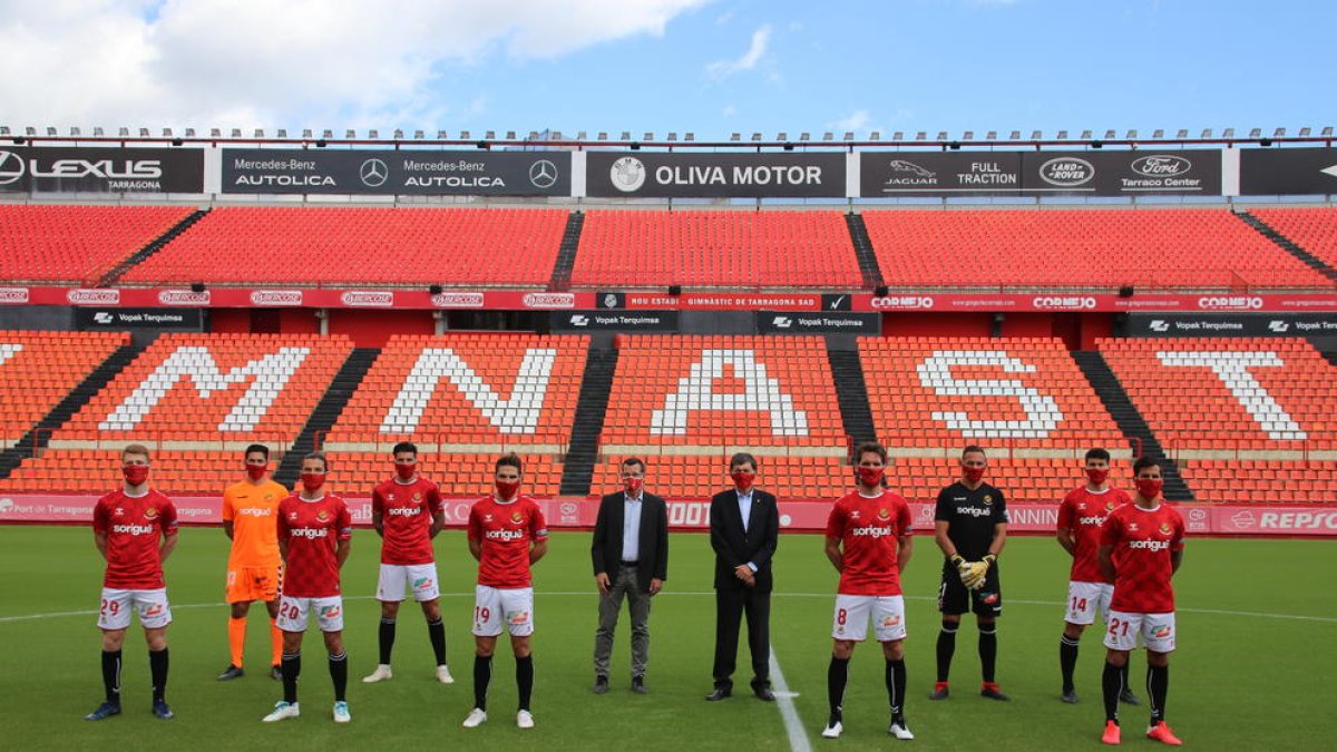 Los jugadores, el presidente y el director deportivo.