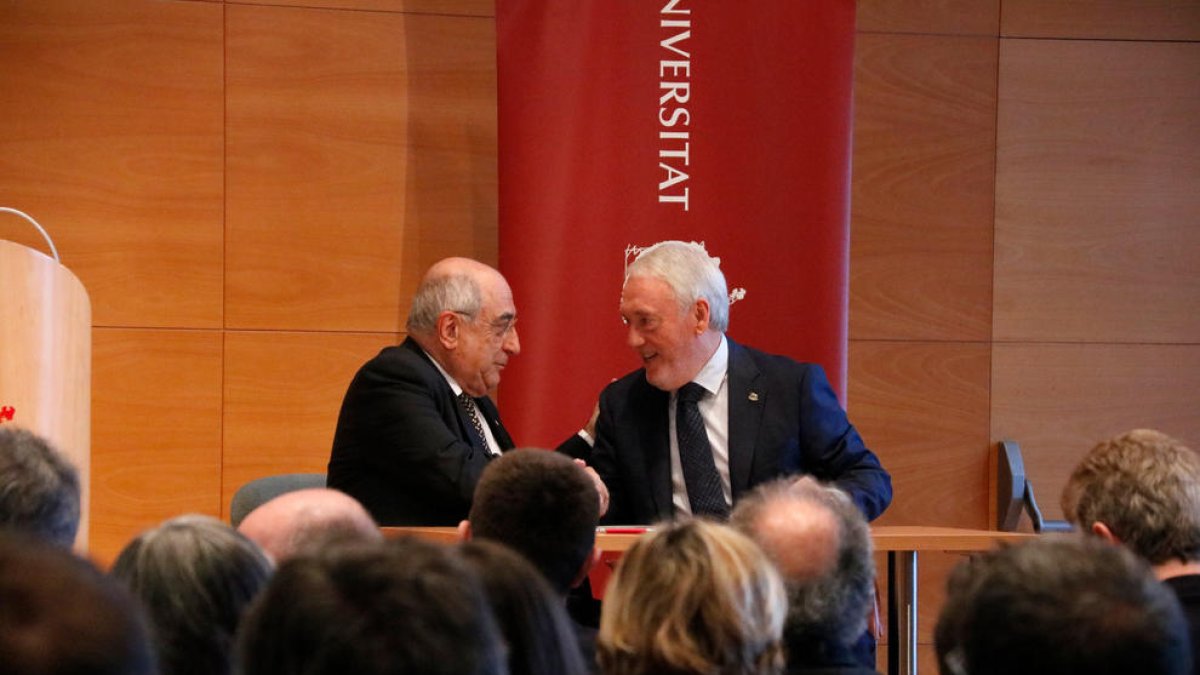 El conseller Joaquim Nadal y el nuevo presidente del Consejo Social de la URV, Josep Poblet.