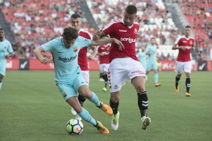 Imágenes del partido que ha enfrentado el Nàstic con el FC Barcelona en el Nuevo Estadio