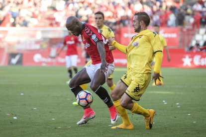 Emaná, con Alberto Benito, exjugador del CF Reus.