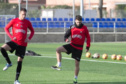 El portuguès Vítor Silva, a la dreta, amb el davanter David Querol, en la tornada als entrenaments després de les vacances de Nadal.