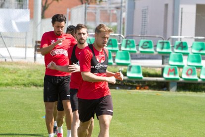 Jesús Olmo, Alberto Benito i Raphael Guzzo, en un dels darrers entrenaments de la setmana.