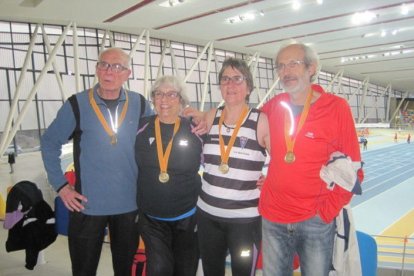 Carme Fuster, Cristina Gallardo, Josep Martí i Eduard Bes, amb les seves medalles d'or.