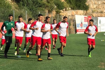 Carlos Blanco, el segon començant per l'esquerra, durant l'entrenament d'aquest matí.