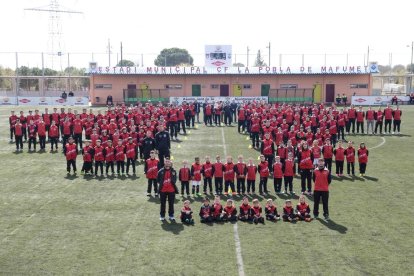 Foto de família dels equips bases de La Pobla.