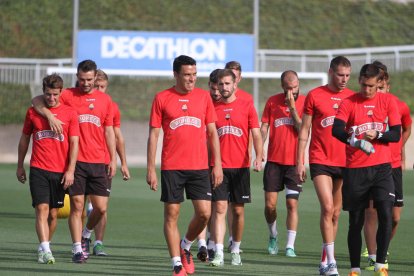 Alguns dels jugadors, entrenant.