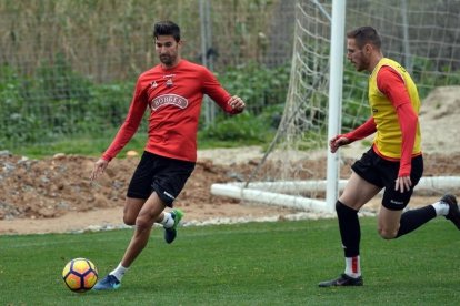 Tebar, a l'esquerra i Querol, a la dreta, durant un entrenament.