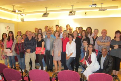 Imatge dels participants durant la presentació de la 33a edició del programa Voluntariat per la llengua de Reus.