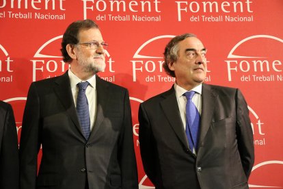 El president del govern espanyol, Mariano Rajoy, amb el president de la CEOE, Juan Rosell.